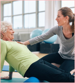 physical therapist working with a senior woman